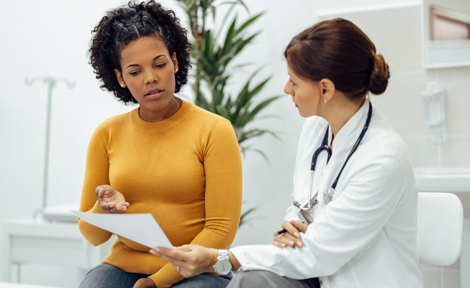 doctor talking to patient